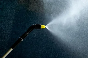 Cleaning windows with a pressure washer